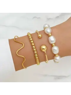 Set de pulseras  -  De perla blanca y  abstracta. Casual